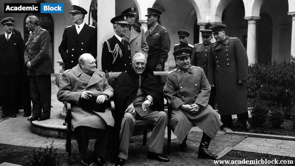 The image shows the British Prime Minister Winston Churchill, U.S. President Franklin Roosevelt, and Soviet leader Joseph Stalin sit together at the Yalta Conference in February 1945. This historic meeting shaped post-war agreements and laid the groundwork for the Cold War.