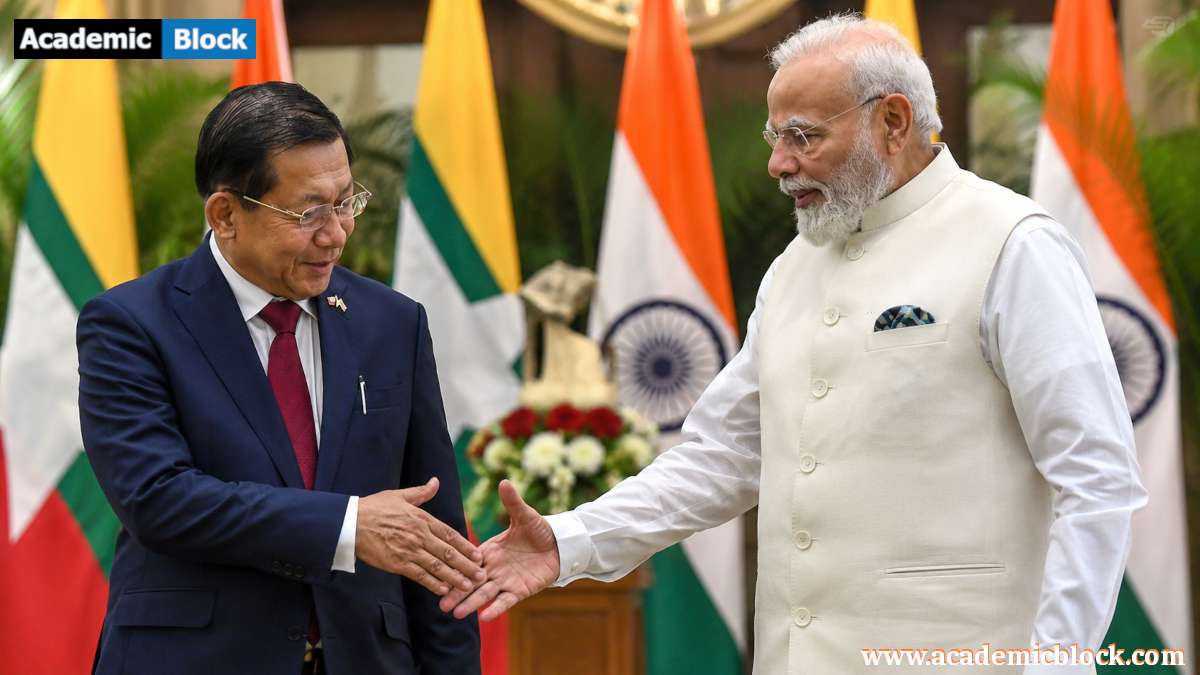 Indian Prime Minister Narendra Modi shakes hands with Myanmar President Min Aung Hlaing during a formal diplomatic meeting.
