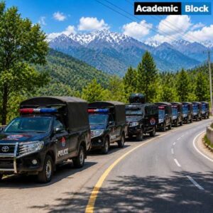 Scene of police vehicles on a mountain road, reflecting heightened security during protests in Pakistan-administered Kashmir following deadly clashes over reserved seats.