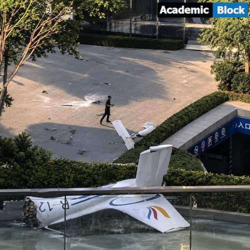 Image showing the damaged section of the aircraft after it crashed into Beijing's CITIC Tower.