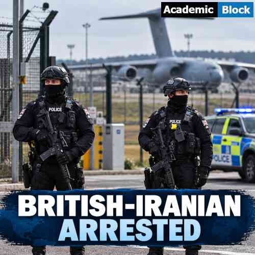 Image showing Armed British police officers guard a secured airbase near RAF Fairford as a military aircraft and police vehicle stand behind them during a terror investigation.