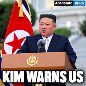 Image showing North Korean leader Kim Jong Un speaks at a podium as he warns the US over support for Taiwan.
