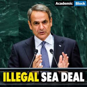 Image shows Greek Prime Minister Kyriakos Mitsotakis speaks at a podium, addressing Greece’s opposition to the Turkey-Libya maritime deal.