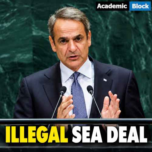 Image shows Greek Prime Minister Kyriakos Mitsotakis speaks at a podium, addressing Greece’s opposition to the Turkey-Libya maritime deal.