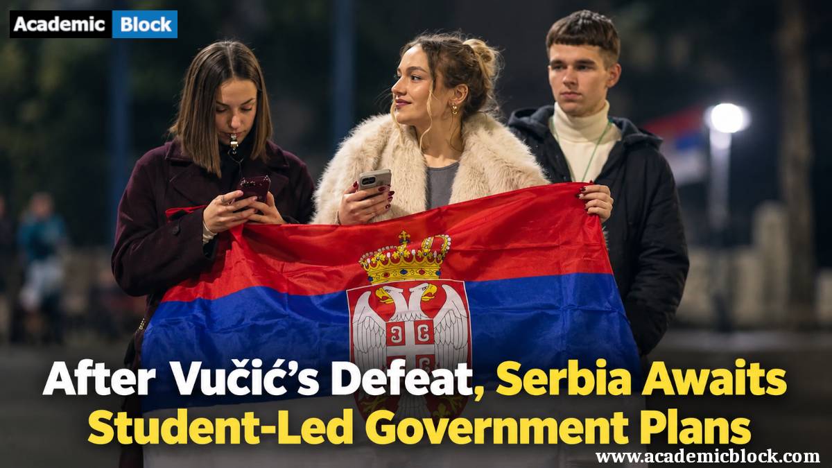 Three Serbian students hold the national flag during a public gathering, as Serbia faces uncertainty over plans for a student-led government following Vučić’s defeat.