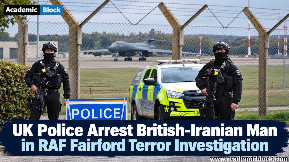 Image showing UK police officers guard RAF Fairford as a military aircraft and police vehicle stand behind them during an investigation into the arrest of a British-Iranian man.